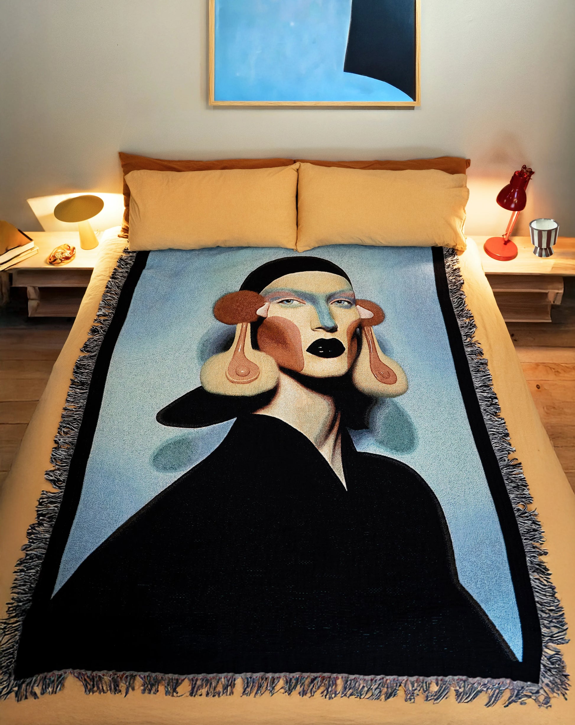 Claude woven art blanket on bed